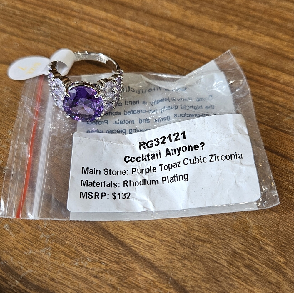 Bomb Party Purple Topaz Cubic Zircornia With Rhodium Plating Size 7 Ring.